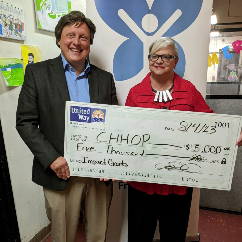Caring for the Hungry and Homeless in Peekskill (CHHOP) was awarded a $5,000 Community Impact grant. United Way CEO Tom Gabriel and CHHOP CEO Cynthia Knox are pictured.
